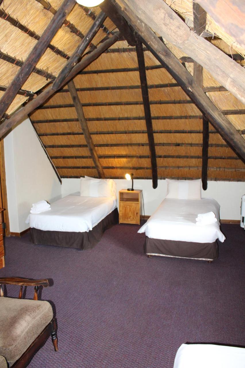 Dragon Peaks Mountain Resort Champagne Valley Bagian luar foto
